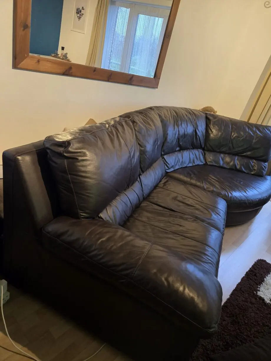 Dark Brown DFS Leather curved Sofa