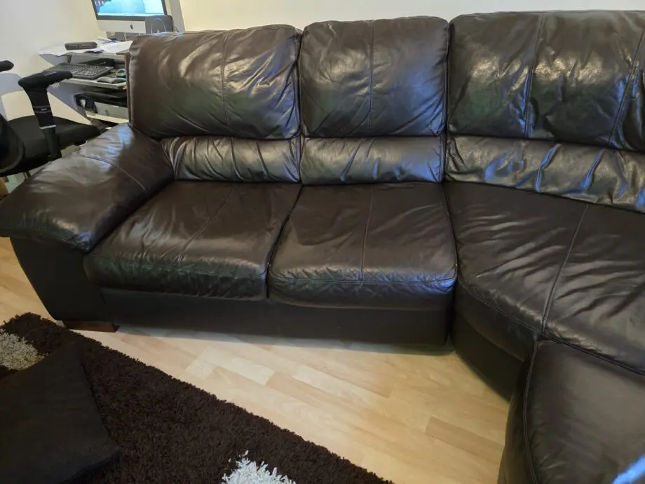 Dark Brown DFS Leather curved Sofa