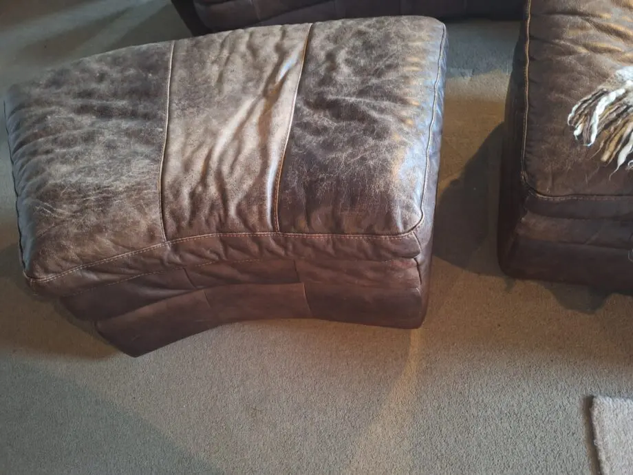 Large curved leather sofa + chairs + footstools
