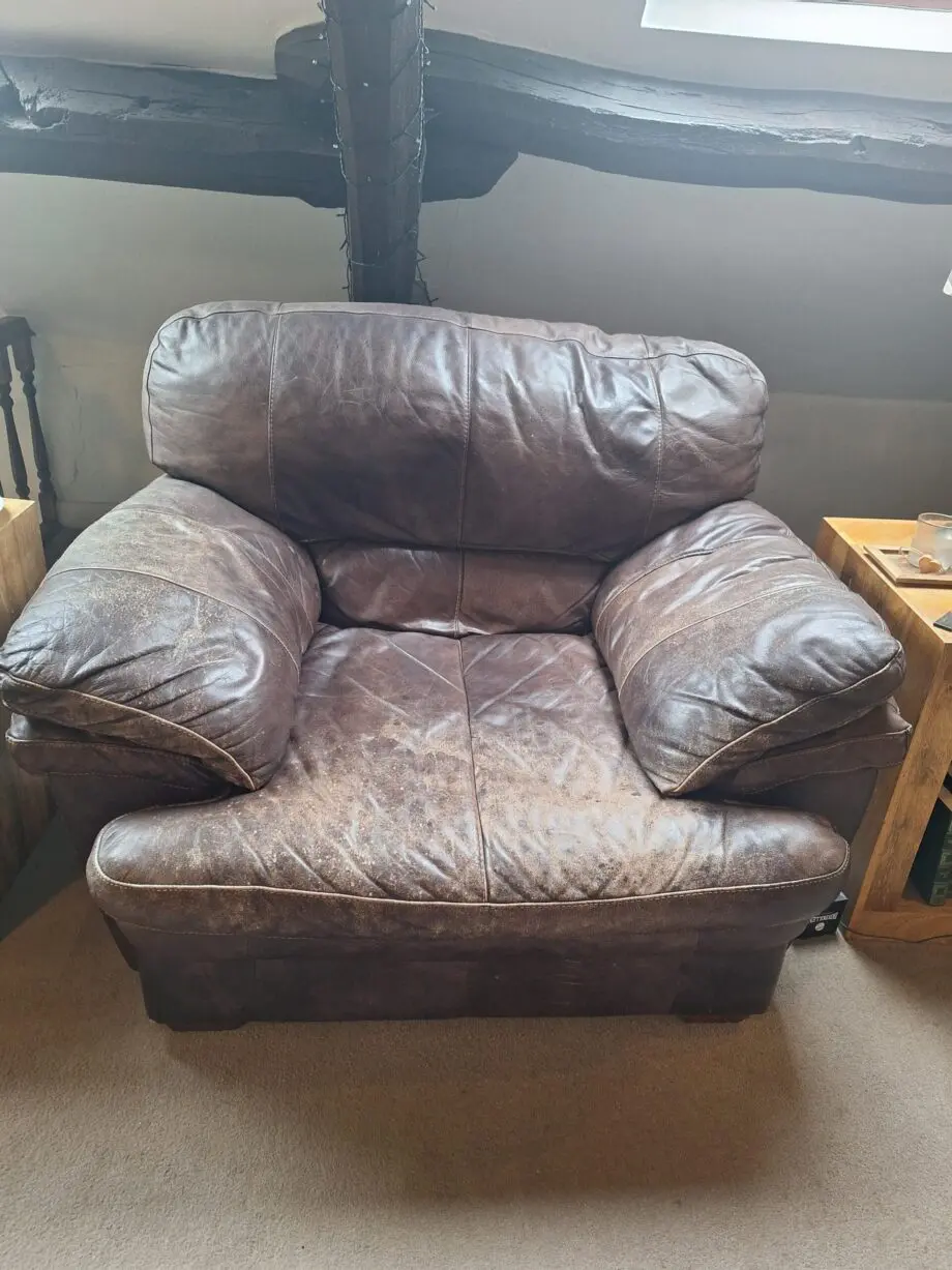 Large curved leather sofa + chairs + footstools