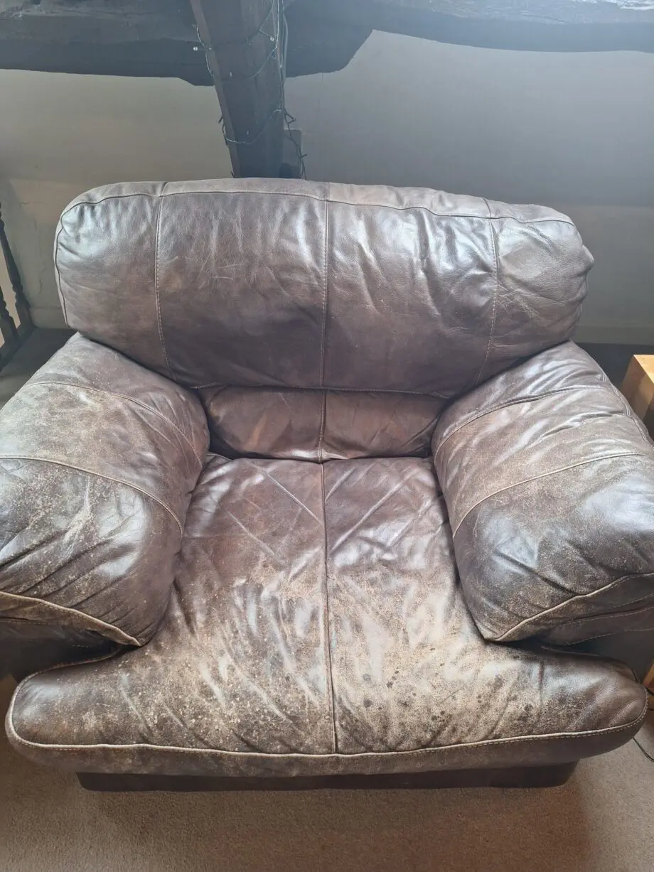 Large curved leather sofa + chairs + footstools