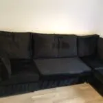 Black plush corner sofa