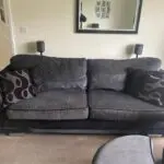 DFS Shannon large black and grey sofa and swivel cuddle chair with footrest