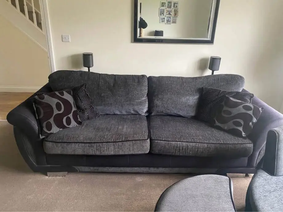DFS Shannon large black and grey sofa and swivel cuddle chair with footrest