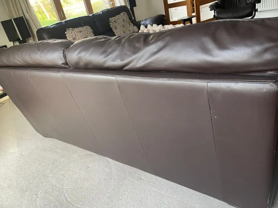 2 x three seater brown leather sofas