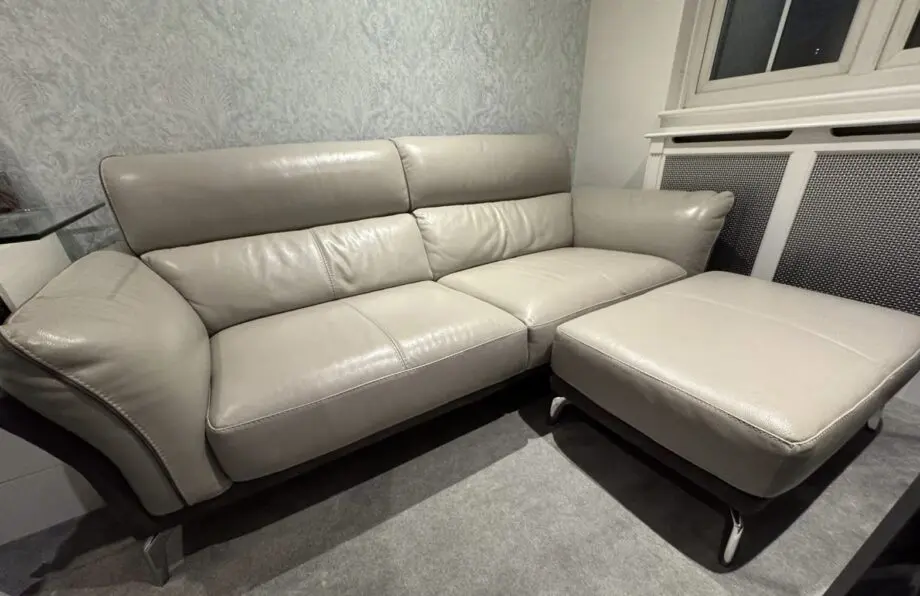 DFS Three seater + footstool - leather two tone