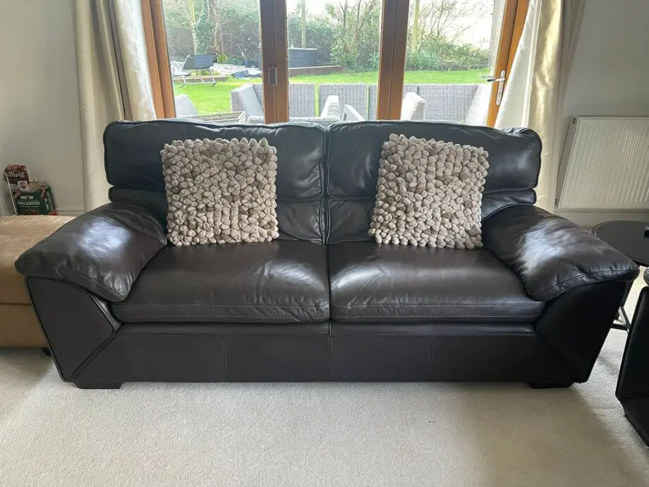 2 x three seater brown leather sofas