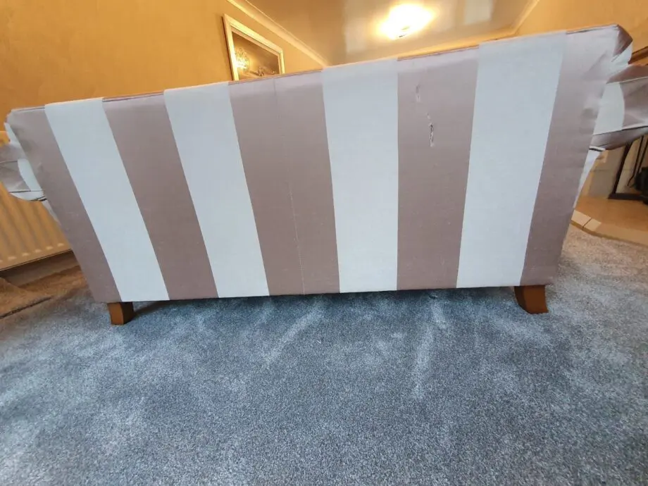Gold and beige stripe 2 seater sofa