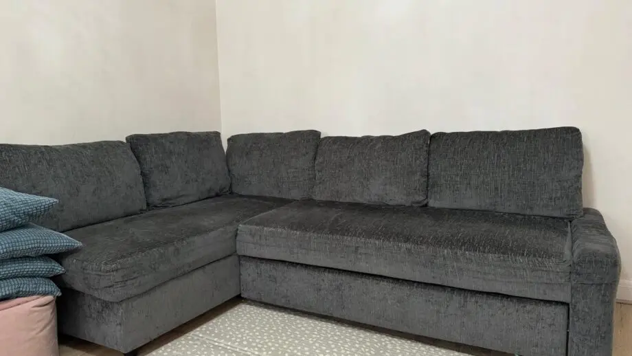 Corner sofa bed with storage (IKEA Friheten)