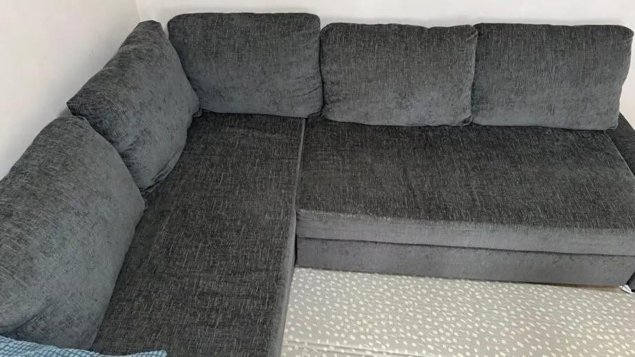 Corner sofa bed with storage (IKEA Friheten)