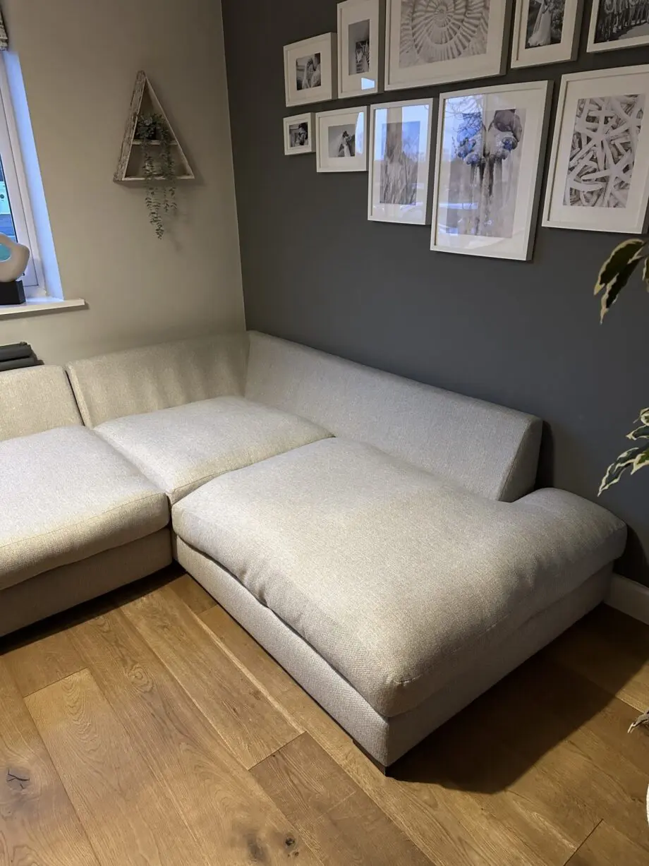 Corner sofa, accent chair and round footstool.