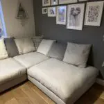 Corner sofa, accent chair and round footstool.