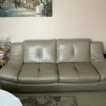 Quality neutral colour leather sofa and matching snuggle chair(Sterling Home)