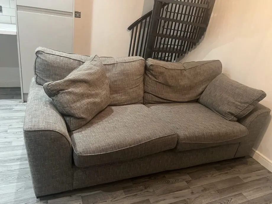 Grey two seater sofa