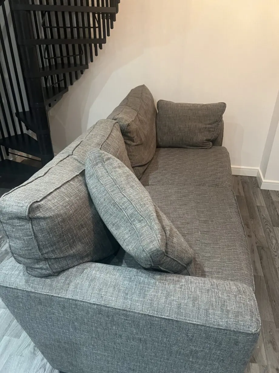 Grey two seater sofa