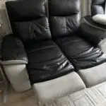 2x 2 seater black leather and grey suede recliner sofas