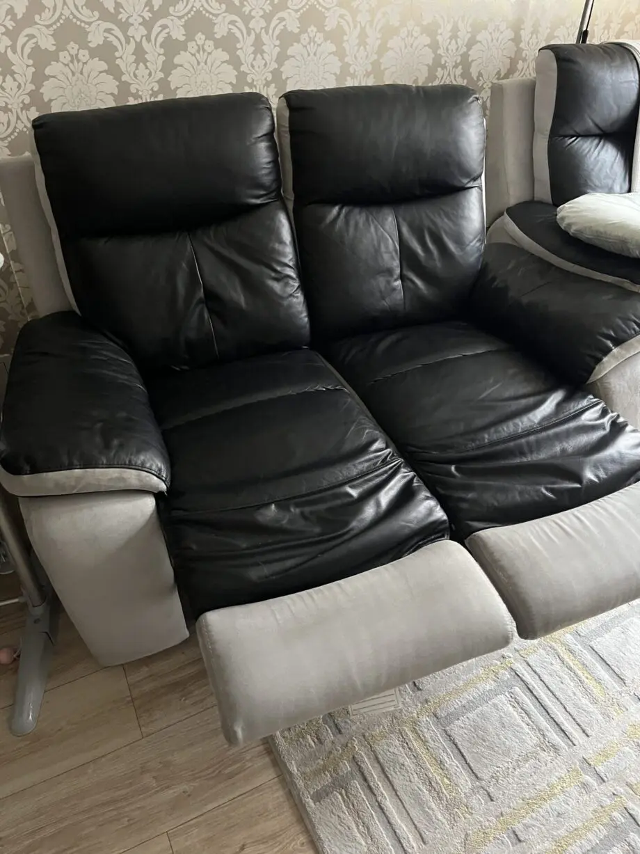 2x 2 seater black leather and grey suede recliner sofas
