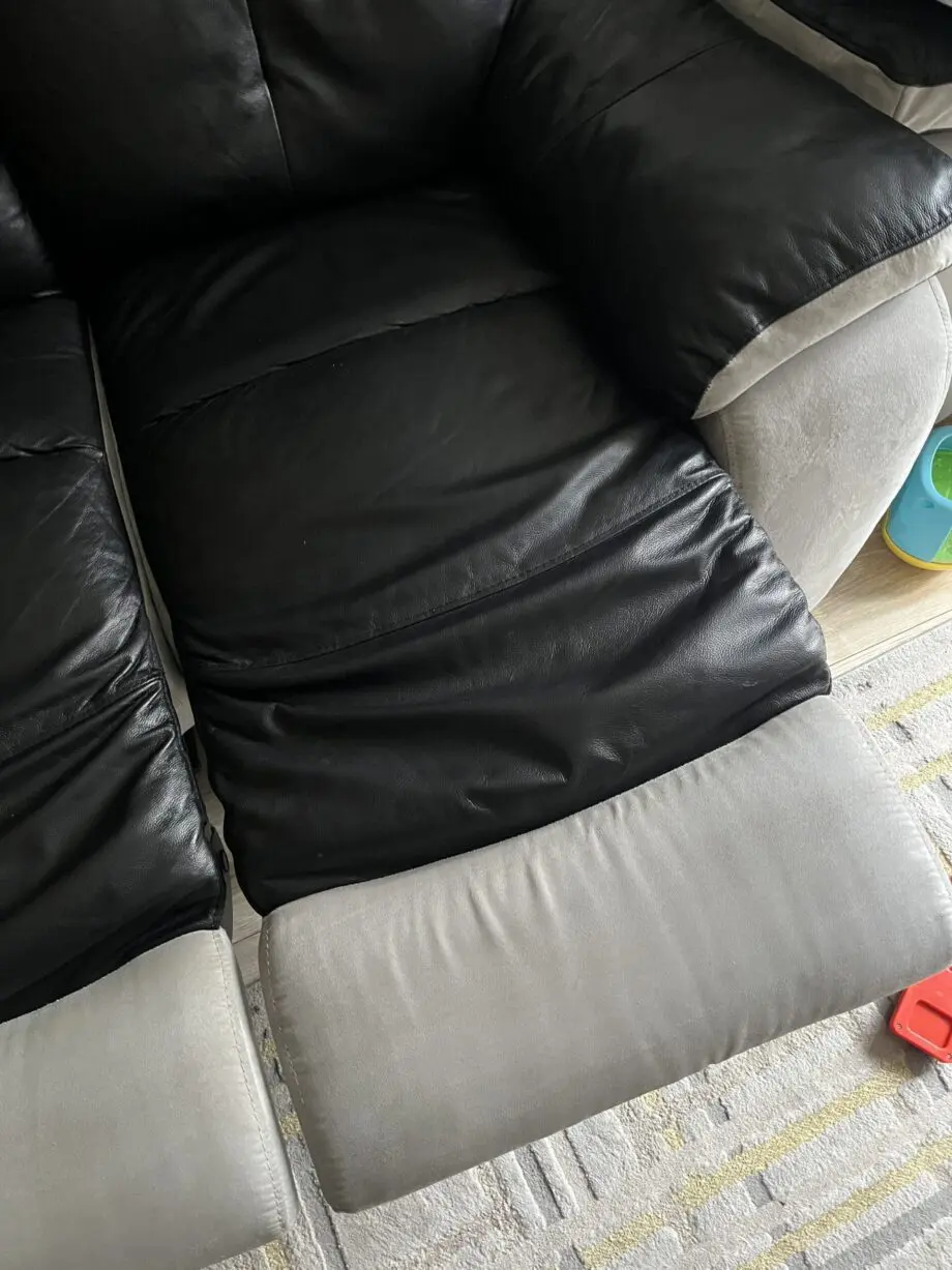 2x 2 seater black leather and grey suede recliner sofas