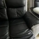 2x 2 seater black leather and grey suede recliner sofas