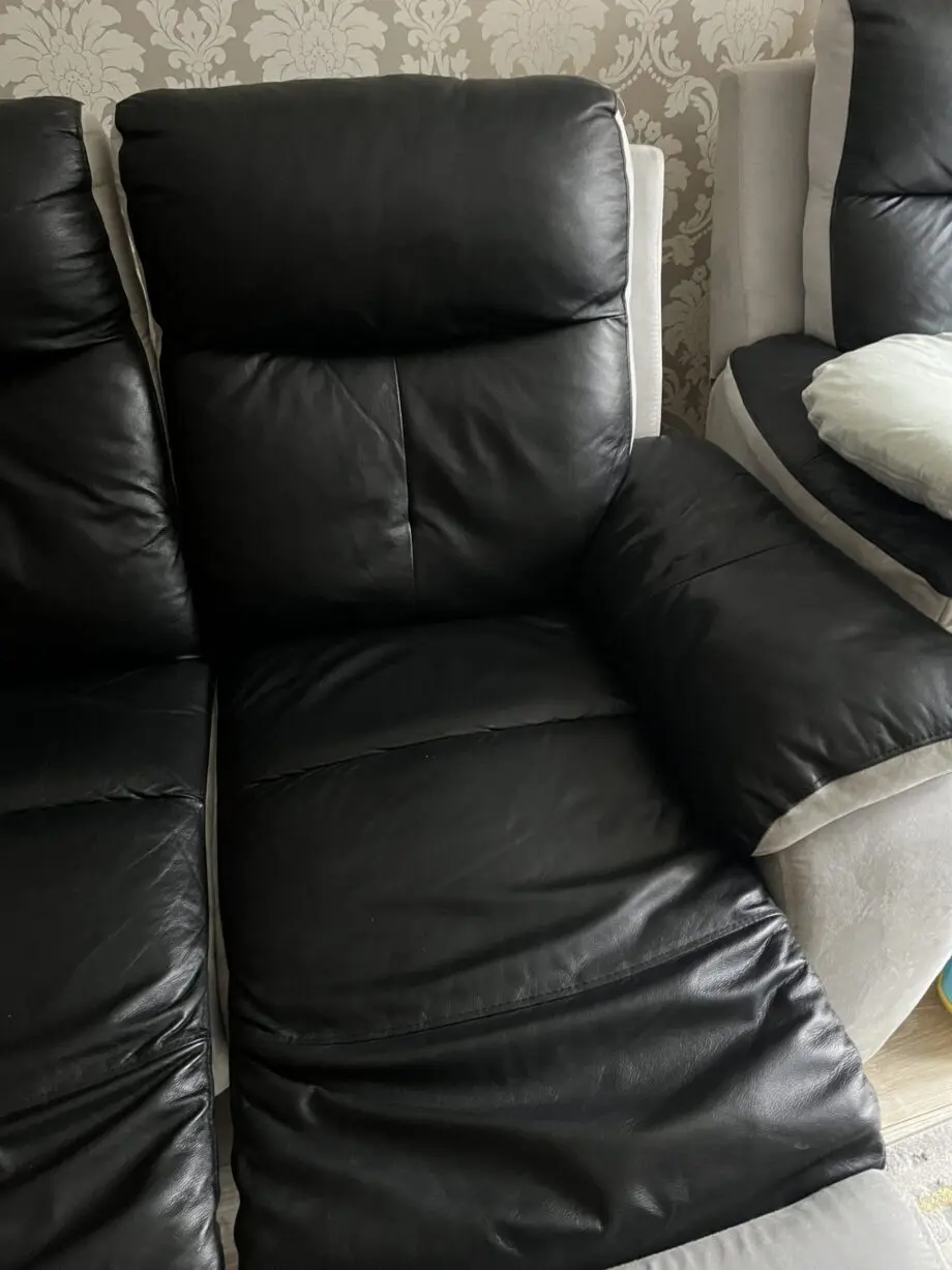 2x 2 seater black leather and grey suede recliner sofas