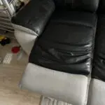 2x 2 seater black leather and grey suede recliner sofas