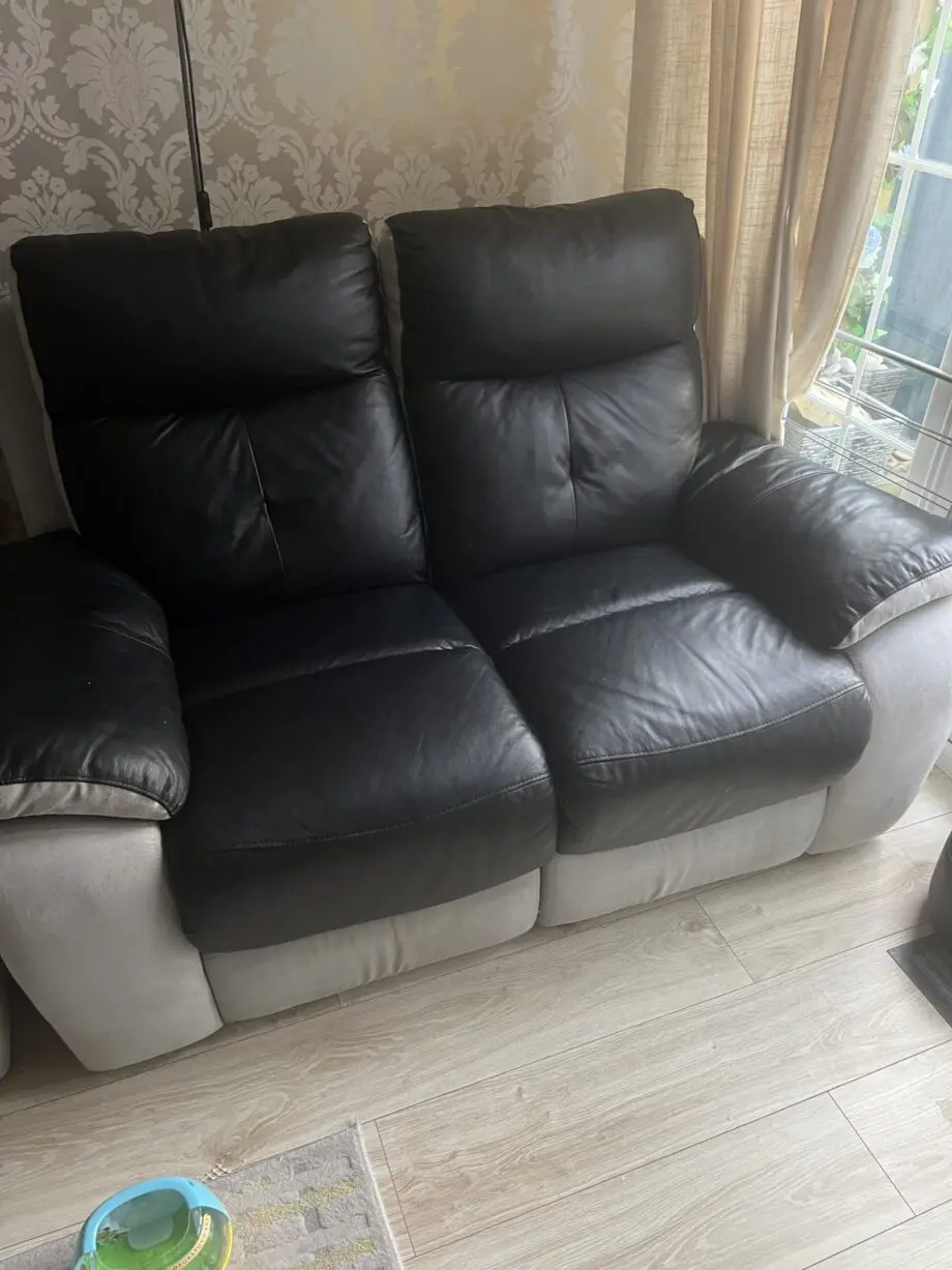 2x 2 seater black leather and grey suede recliner sofas
