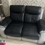 2x 2 seater black leather and grey suede recliner sofas