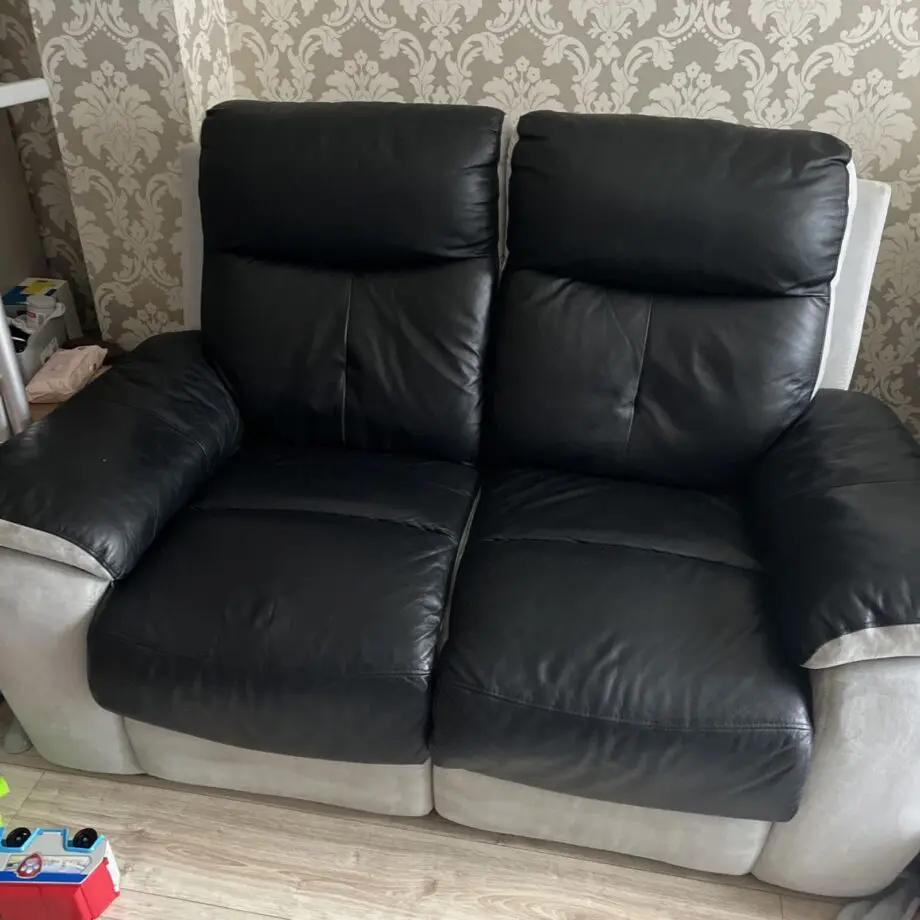 2x 2 seater black leather and grey suede recliner sofas