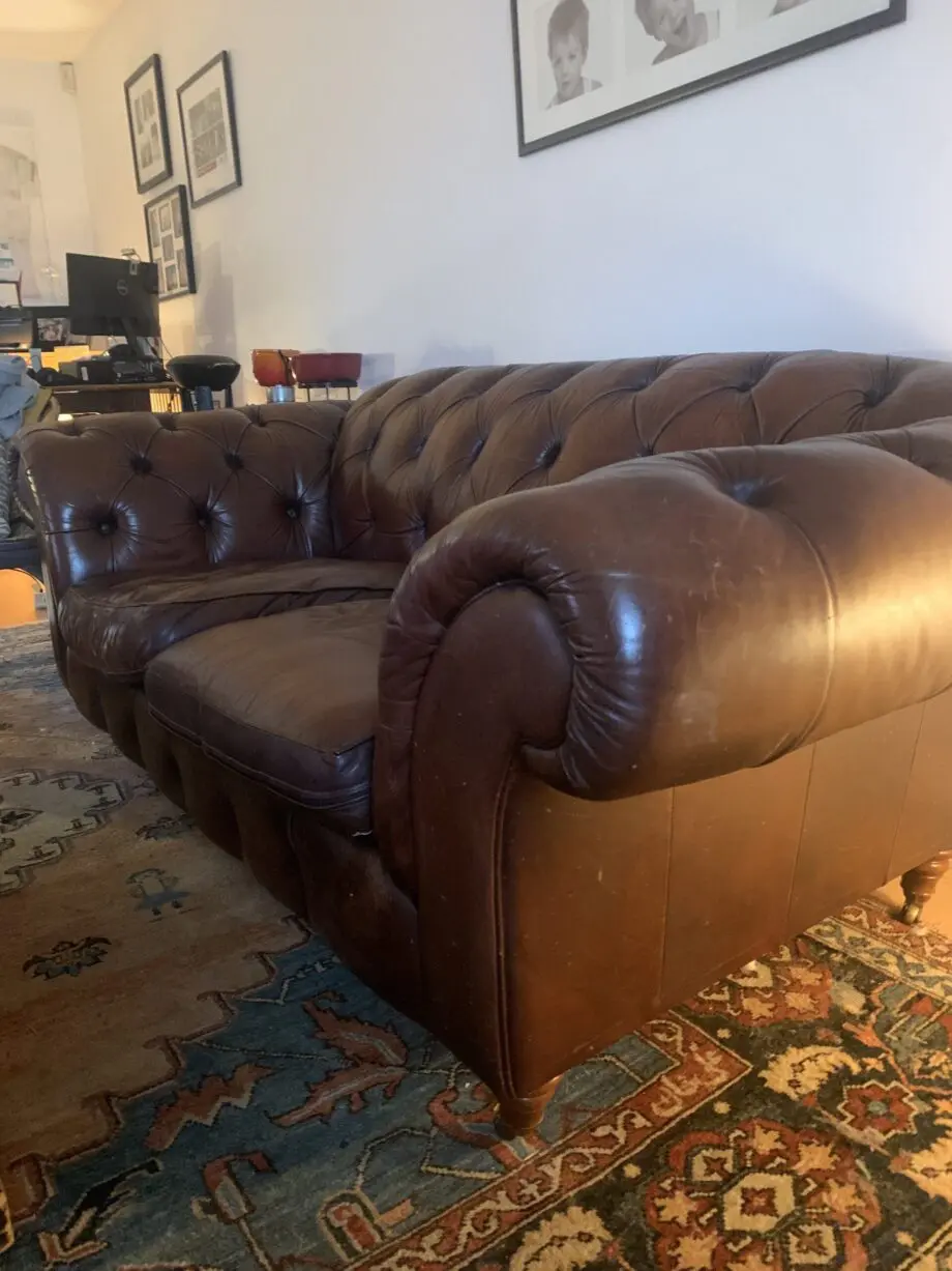 Chocolate brown leather Chesterfield style sofa