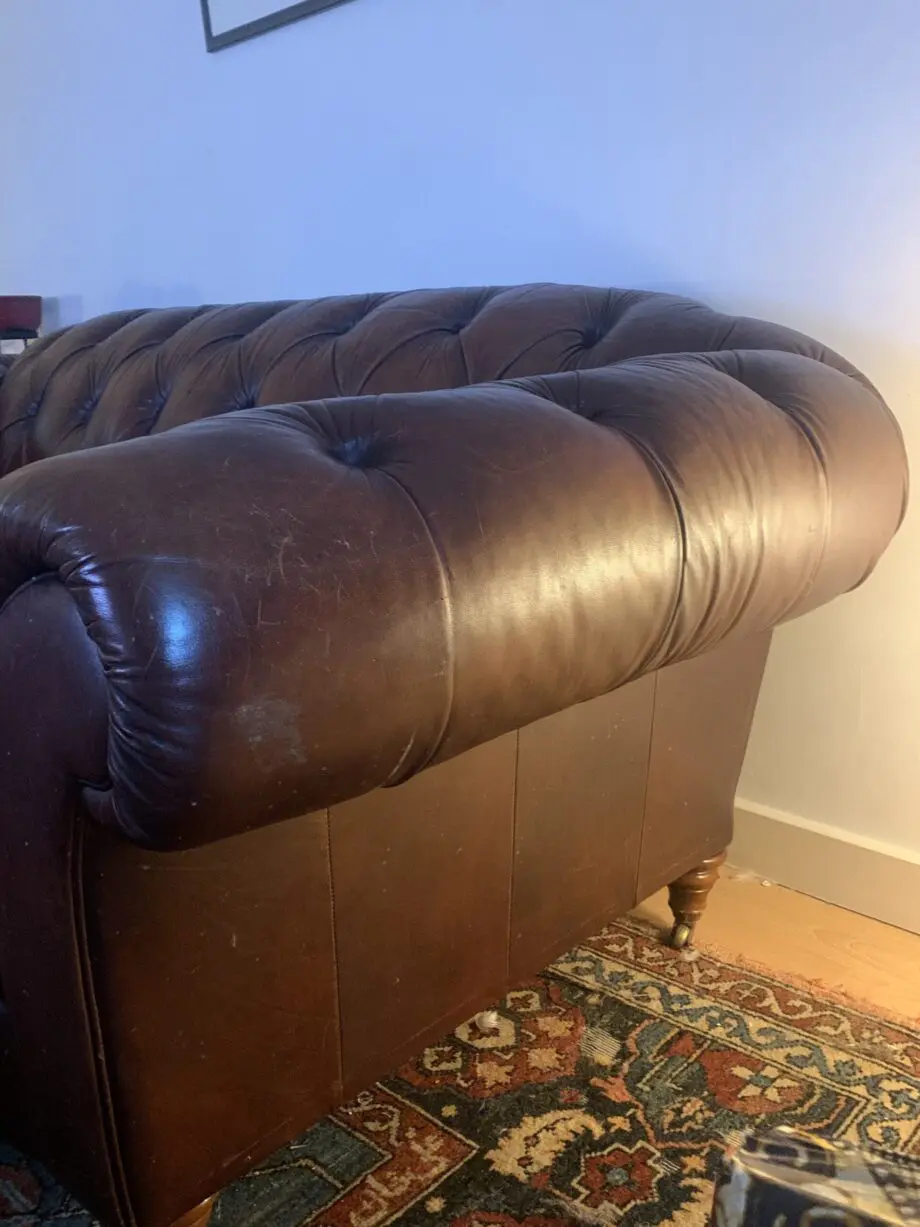 Chocolate brown leather Chesterfield style sofa