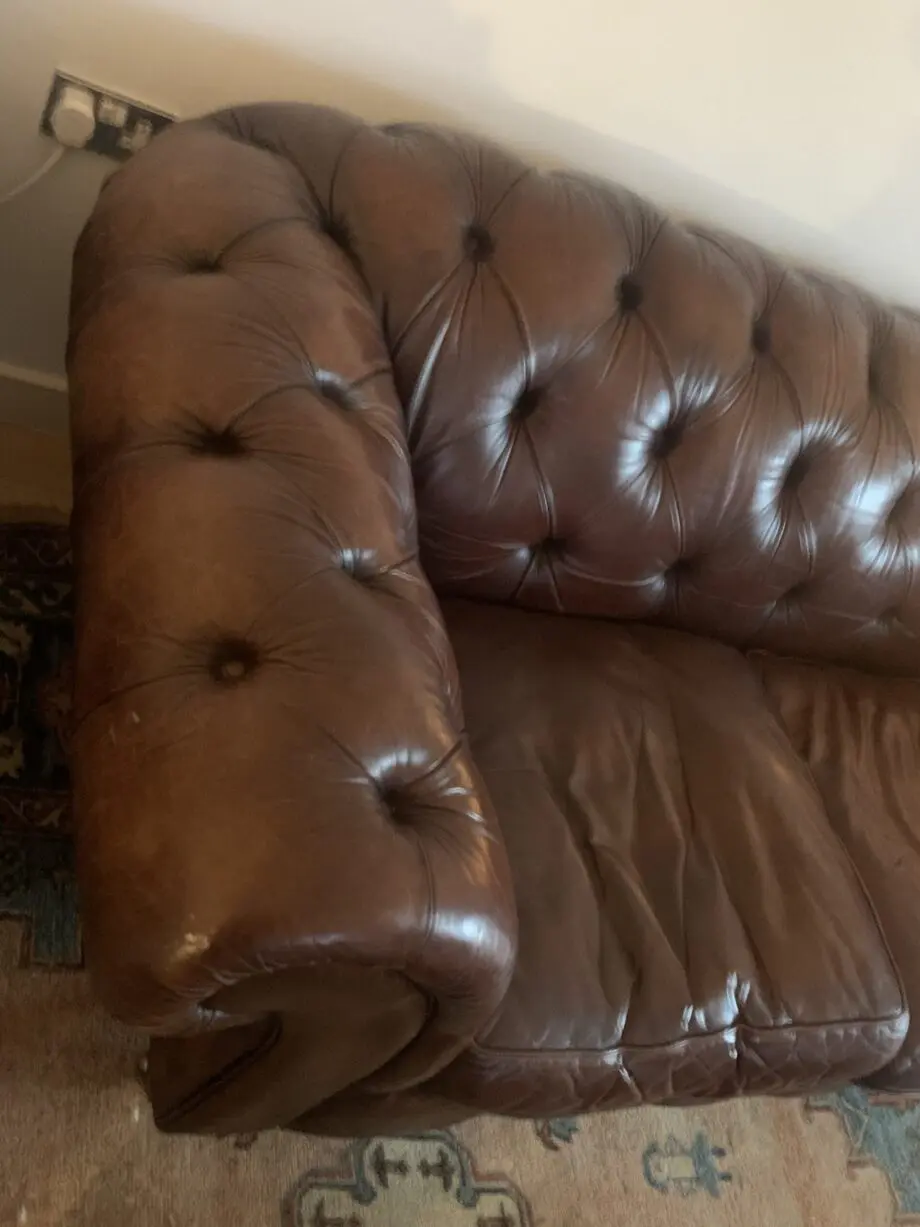 Chocolate brown leather Chesterfield style sofa
