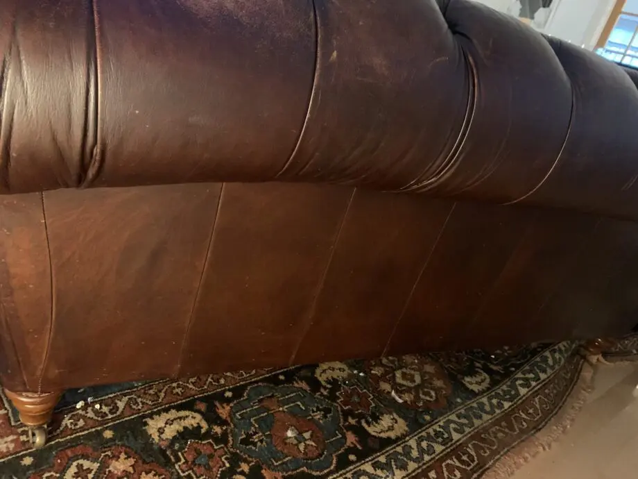 Chocolate brown leather Chesterfield style sofa