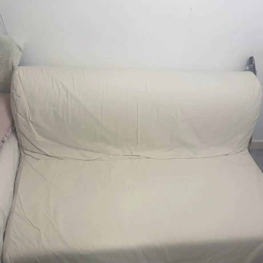 Ikea Sofa bed with cream cover