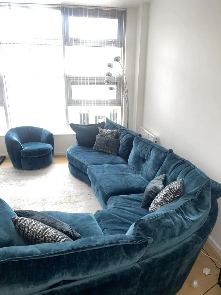 Lee longlands slumber blue velvet sofa, swivel chair and table.