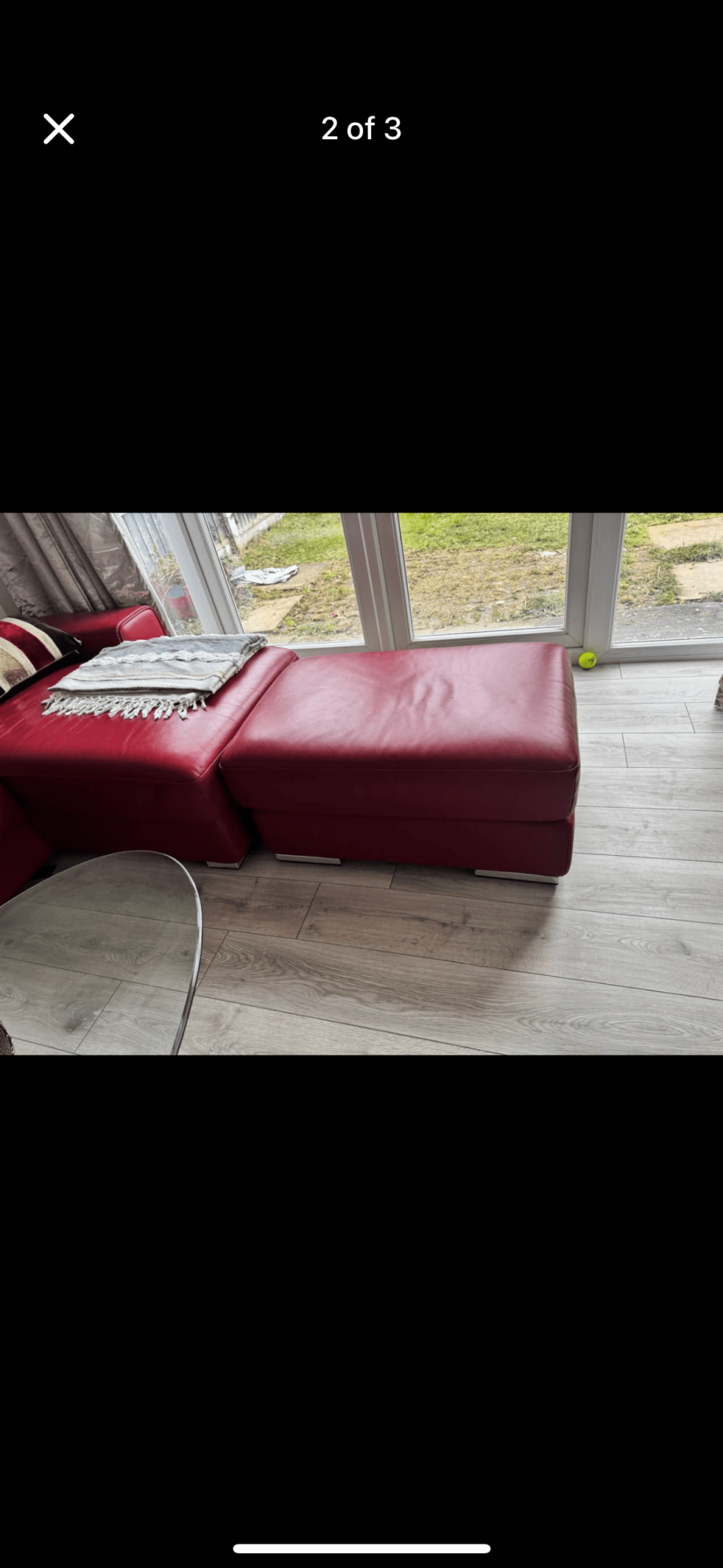 Red leather L shaped sofa bed