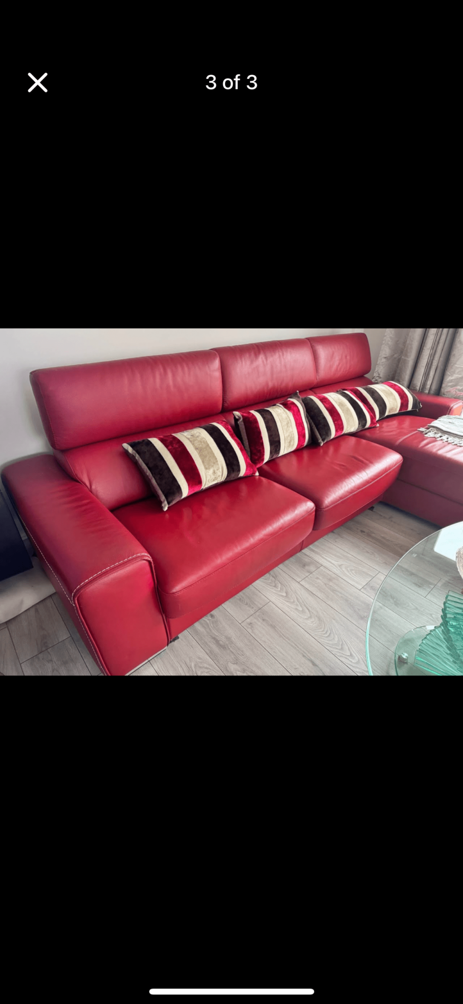 Red leather L shaped sofa bed