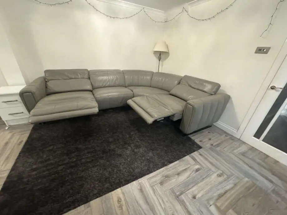 Electronic Reclining Grey Corner Sofa in Good Condition