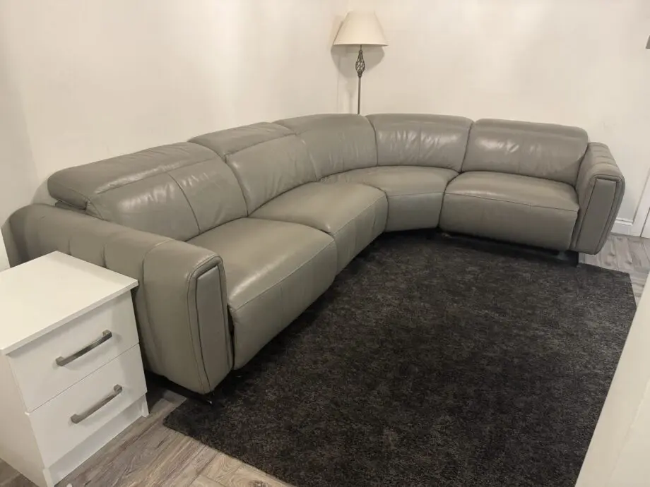 Electronic Reclining Grey Corner Sofa in Good Condition