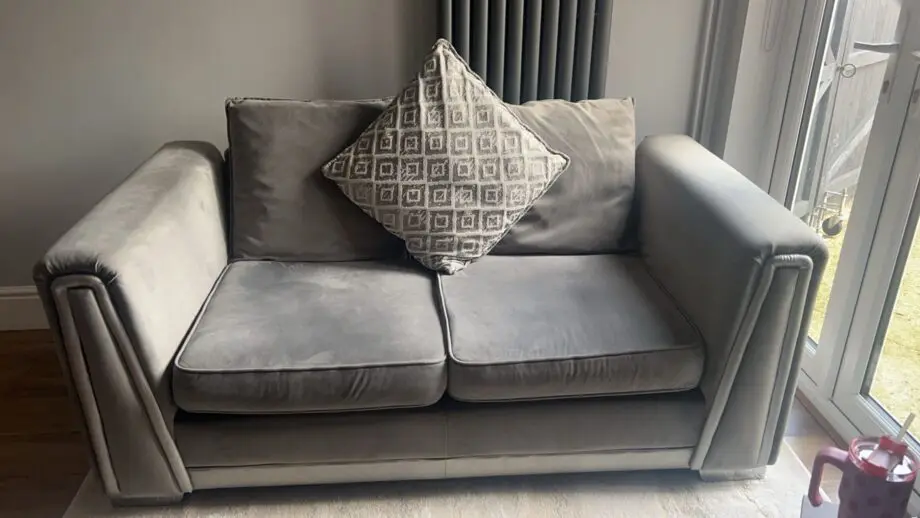 Large grey velvet sofa