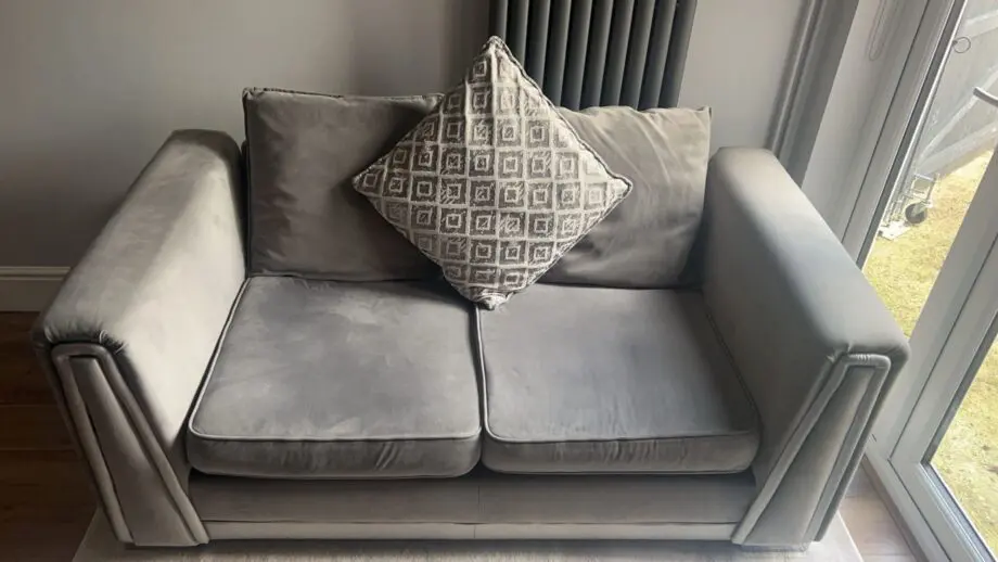 Large grey velvet sofa