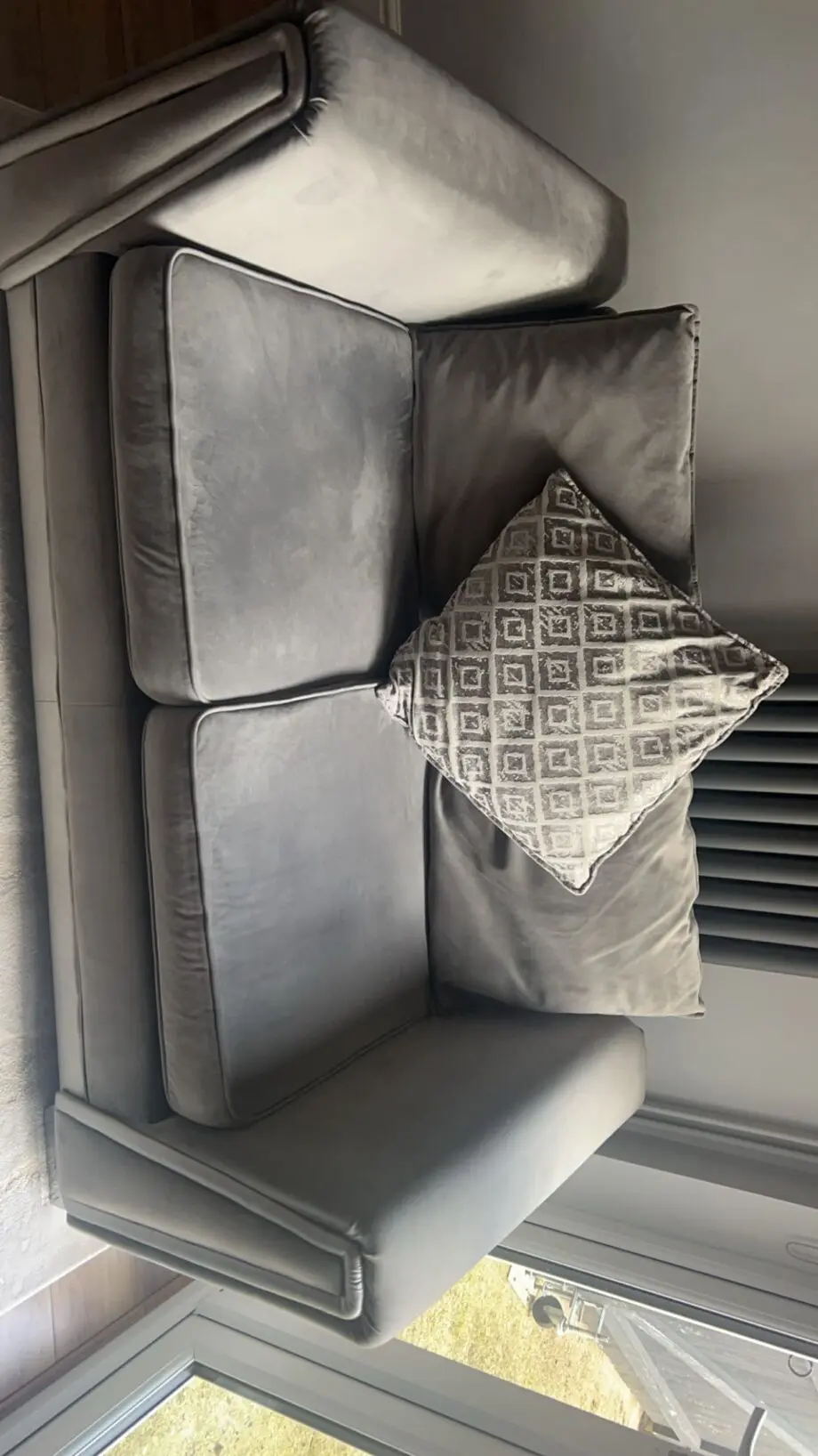 Large grey velvet sofa