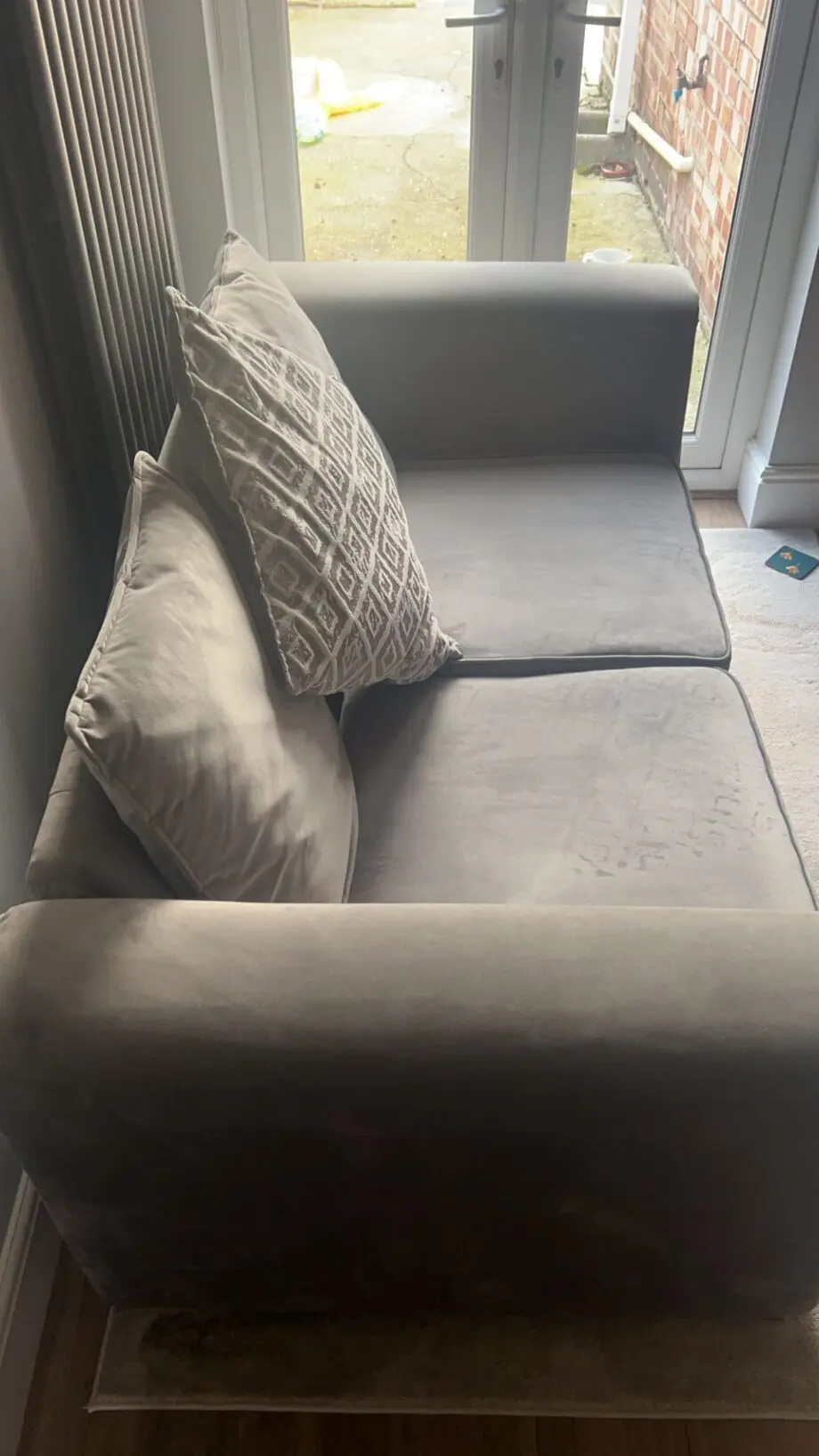 Large grey velvet sofa