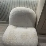 Eichholtz Clément Swivel Chair In Bouclé Cream
