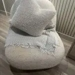 Eichholtz Clément Swivel Chair In Bouclé Cream