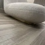 Eichholtz Clément Swivel Chair In Bouclé Cream