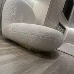 Eichholtz Clément Swivel Chair In Bouclé Cream