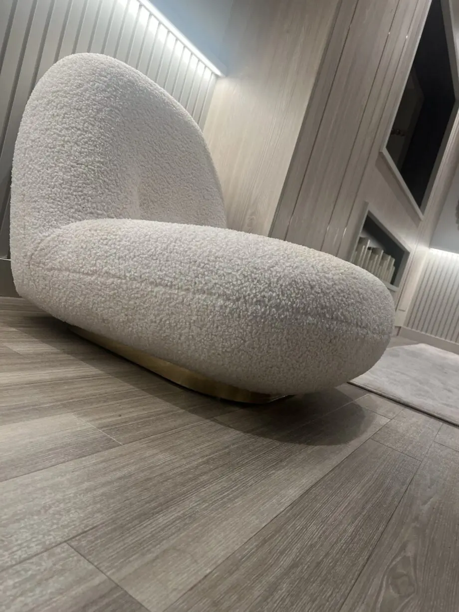 Eichholtz Clément Swivel Chair In Bouclé Cream