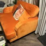 Luxury orange velvet loveseat with ottoman stool