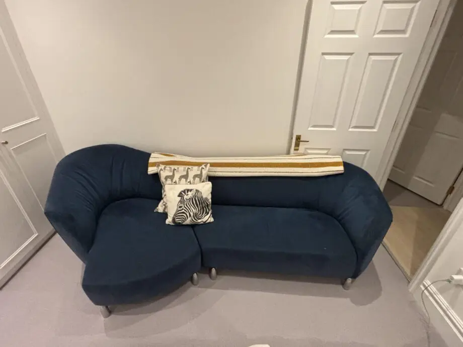 Blue Leolux 3-4 person chaise lounge style sofa