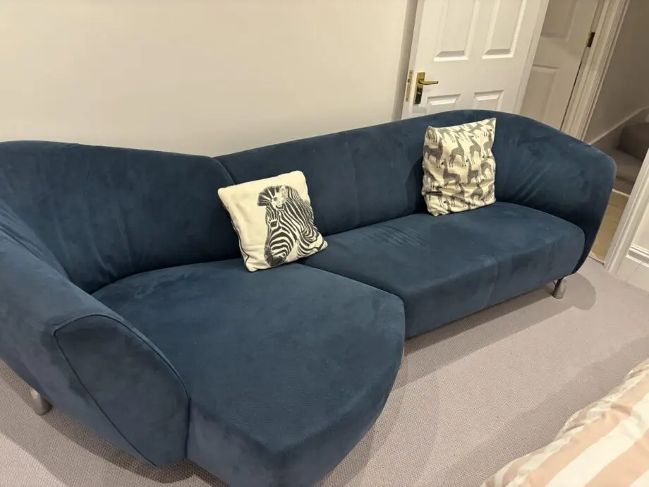 Blue Leolux 3-4 person chaise lounge style sofa